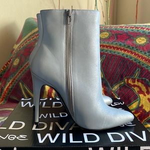 Silver zip up heeled booties